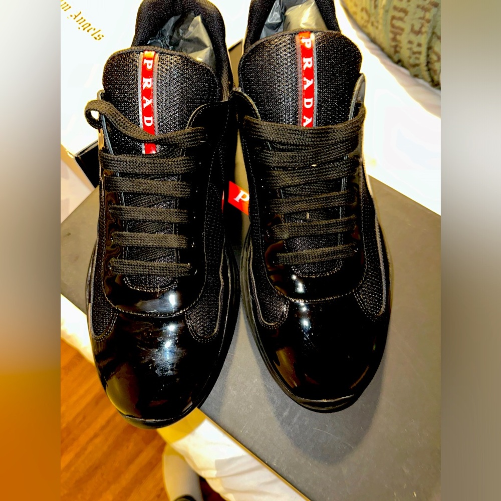Size 12 Pradas and Size 12 Palm Angel sneakers